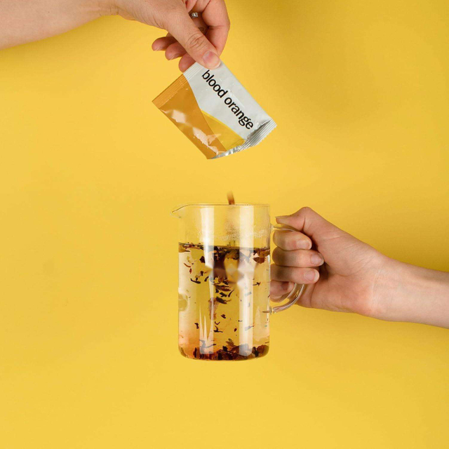 Assorted tea bags, including Black and White Peach Irish Breakfast Tea and Green Tea